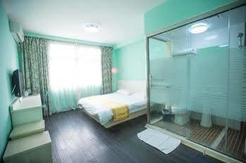 Qingdao Aisen Apartment Hotel Exterior photo